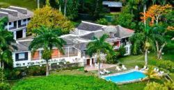 This six bedroom house is located in the upscale gated neighbourhood of Great River (Private) and sits on five acres of well fruited land