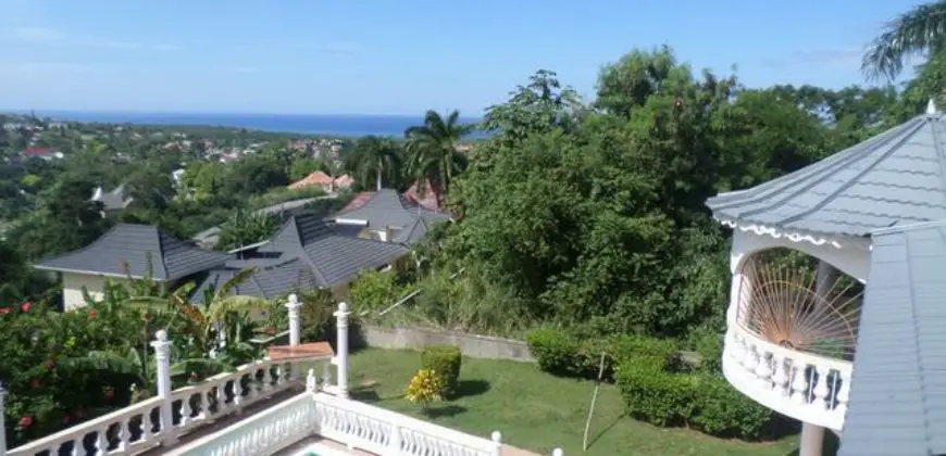 3-storey villa which sits atop 21, 039 sq. ft of land in the upscale community of Ironshore, Montego Bay Jamaica for sale
