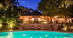 This updated and beautifully decorated villa is a classic british colonial with louvered windows to enjoy the breezes and antique four-poster beds that look out to the terrace, the pool and a well manicured garden.
