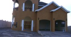 Beautiful split level house in a secure, gated community that gives a mesmerizing view of the Caribbean Sea from any angle