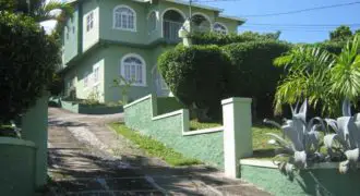 This two family house (set up as a townhouse) is is located in a prestigious section of Spring Valley, St Mary with an excellent view of the the Caribbean Sea