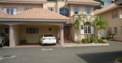 Fully furnished, tri-level 4,600 sq ft townhouse in lovely garden setting with waterfall, Koi pond and pool