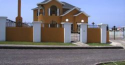 Beautiful split level house in a secure, gated community that gives a mesmerizing view of the Caribbean Sea from any angle