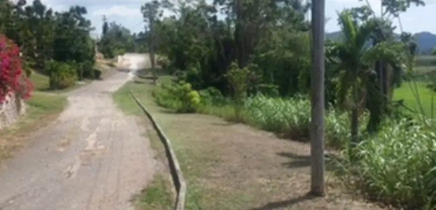 This is a residential lot in the community of Orange Bay Country Club, Hanover