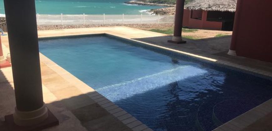 Beachfront mediterranean styled 4 bedroom, 4 1/2 bathroom resort villa for sale in Portmore