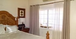 Beautifully furnished 2 bedroom, 2 bathroom townhouse configured on one level offering high end fittings and fixtures, hardwood floors and state of the art appliances