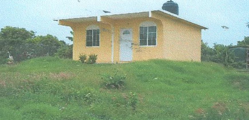 NHT Property with two (2) bedrooms, one (1) bathroom and living/dining/kitchen area
