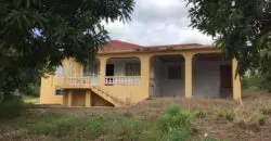 Two acres of lush farm land with a 4 bedroom house for sale in Junction St Elizabeth