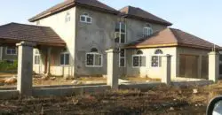4 bedrooms 3 bath unfinished house for sale in a quiet residential area of Clarendon, Don’t miss this opportunity to complete your dream house