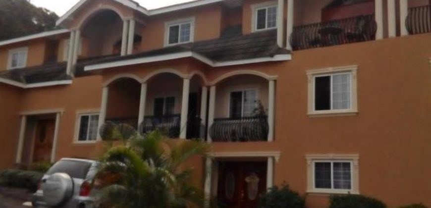 Investment opportunity! 3 bedroom 2 1/2 bathroom townhouse in a gated complex with sea view