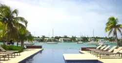 Set in Montego Bay’s most desirable waterfront community, this upper floor, 1 bedroom apartment offers the utmost comfort with an open-plan layout, air conditioning throughout, an airy balcony, and extra sunlight that only an end unit can provide