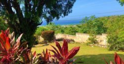 Spacious 6 Bedroom 5 Bathroom split level home sitting on a 1/2 acre estate and overlooking the airport and the Caribbean sea