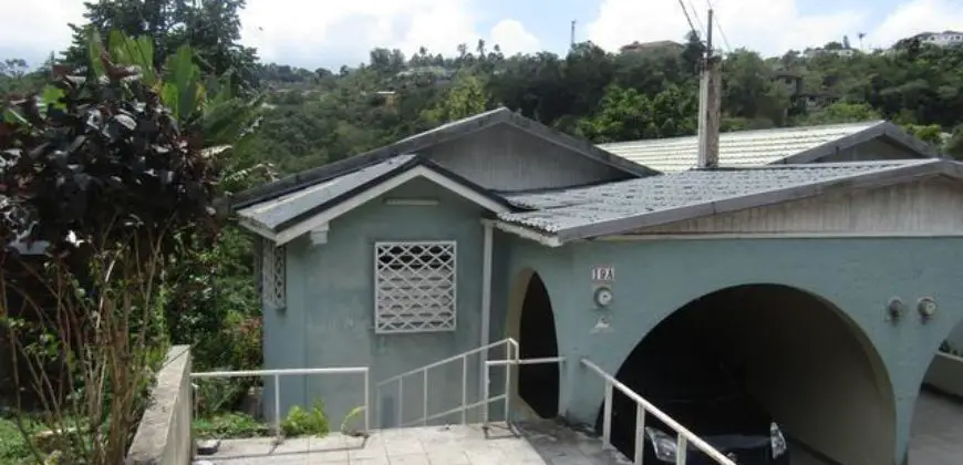 Located in the cool hills of Stony Hill is this spacious duplex home on two levels