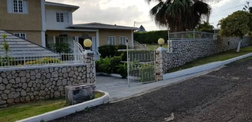 Nicely appointed 5,300 sq. ft split-level Chancery Hall home that sits on just under 20,000 sq. ft of sloping land, offering pristine views of the mountain and the city extending to Kingston Harbour & Port Royal