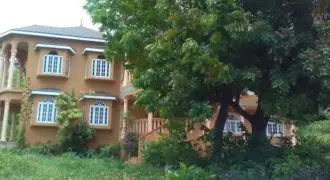 This 6 bed room house is nestled in the hills of Chancery Hall, a middle to upper residential area, with an elaborate view of the city of Kingston