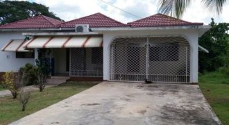 This well-built 3 bedroom 2 bath house with back and front porches is located in a quiet community