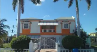 2 storey house in Greater Portmore with 3 beds 3 baths, living, dining and entertainment areas