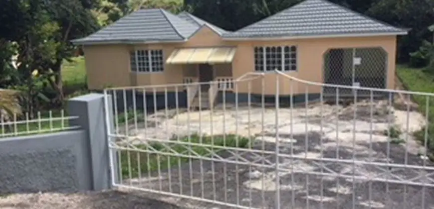 On site is a single family residence with the following facilities: Master bedroom with ensuite bathroom and closet, two (2) other bedrooms with closets, one (1) other bathroom, living/dining room, kitchen, verandah, single car garage, rear porch, laundry room and linen closet