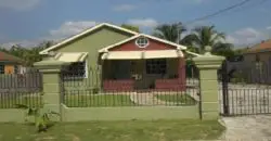 Bright, airy and move in ready, this well kept 2 bedroom and 1 bathroom home with ample lot space to expand is located in the quiet and secure gated community of Magil Palms Estate