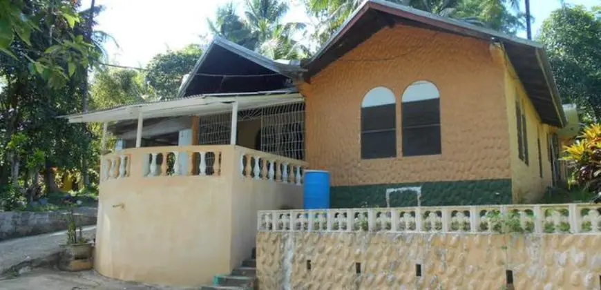 Own this partially furnished 3-bedroom 2-bathroom house of 2,500 sq.ft. situated on over 2 acres of farm land