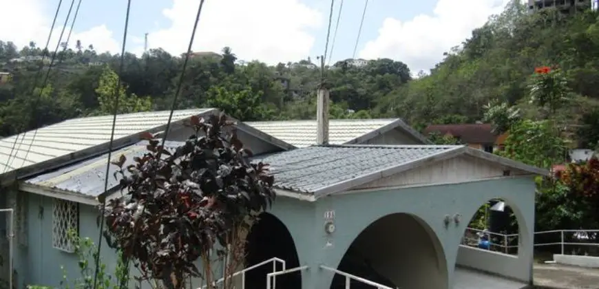 Located in the cool hills of Stony Hill is this spacious duplex home on two levels