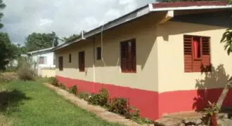 This house is a single family residence comprising of 5 bedrooms, 3 bathrooms, living, dining rooms, kitchen, helper’s room and bathroom, laundry area, front and rear verandahs and carport