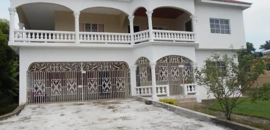 Spacious 5 bedroom 4 bathroom house on over 1/4 acre of lush vegetation with well fruited trees. This lovely house is only an hour east of Montego Bay