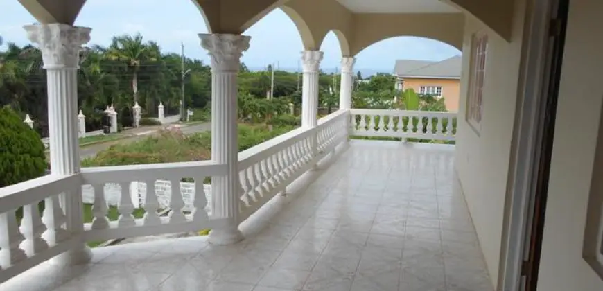 Spacious 5 bedroom 4 bathroom house on over 1/4 acre of lush vegetation with well fruited trees. This lovely house is only an hour east of Montego Bay